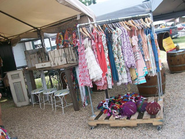 DIY Clothing Rack Garage Sale
 pallet turned clothing rack