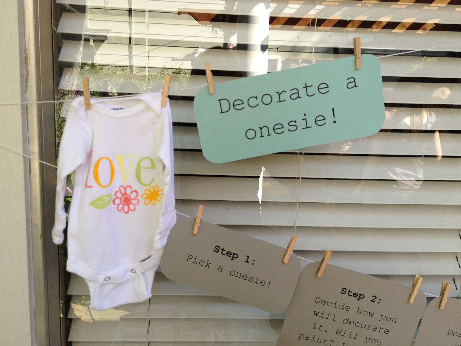 DIY Onesie Baby Shower
 lingering daydreams diy baby shower onesies