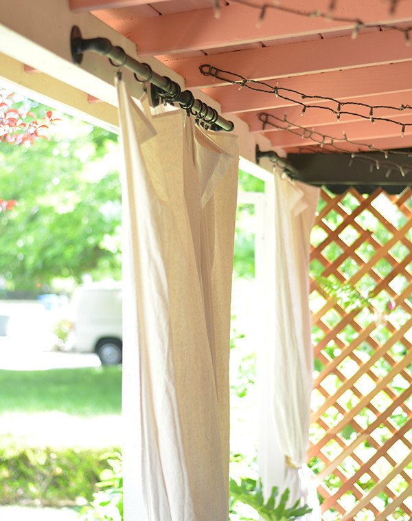DIY Outdoor Curtains For Patio
 A Boho Patio Makeover via The Power Paint