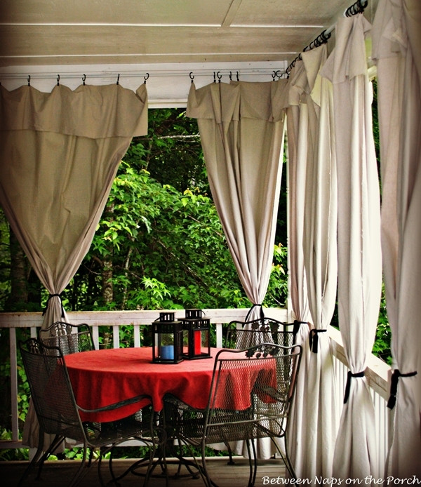 DIY Outdoor Curtains For Patio
 Drop Cloth Curtains for a Porch Add Privacy and Sun Control