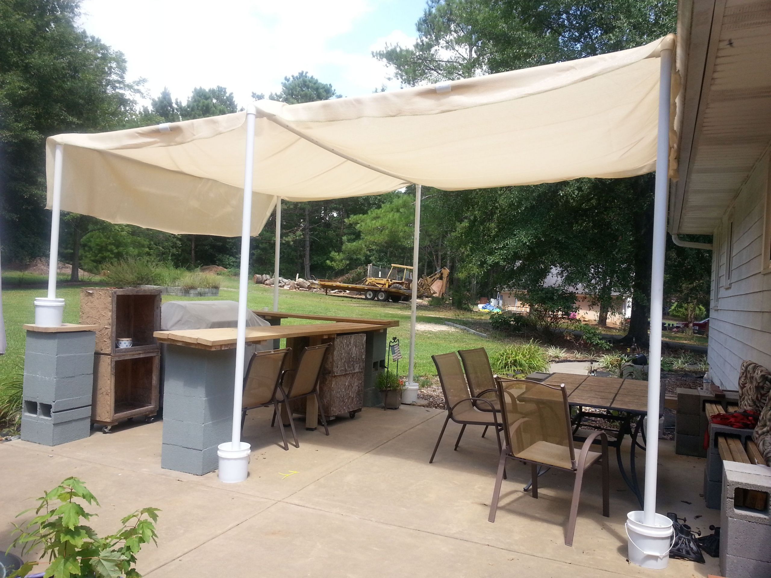 DIY Outdoor Shade Canopy
 Made this canopy to cover the bar seating area this
