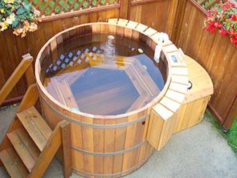 DIY Outdoor Soaking Tub
 18 Ingenious DIY Hot Tub Plans & Ideas Suitable for Any Bud