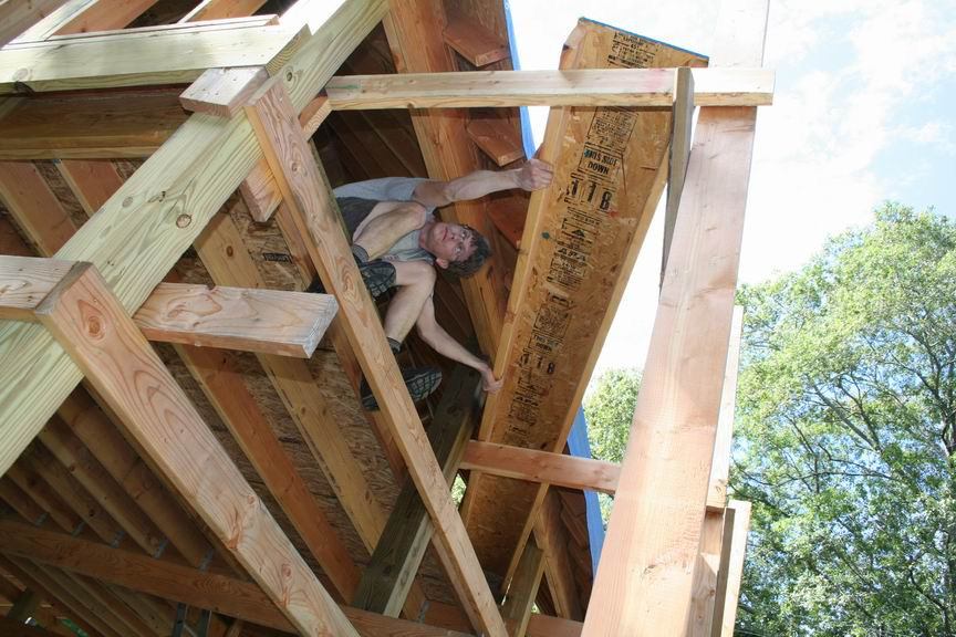 setting wood scaffold planks
