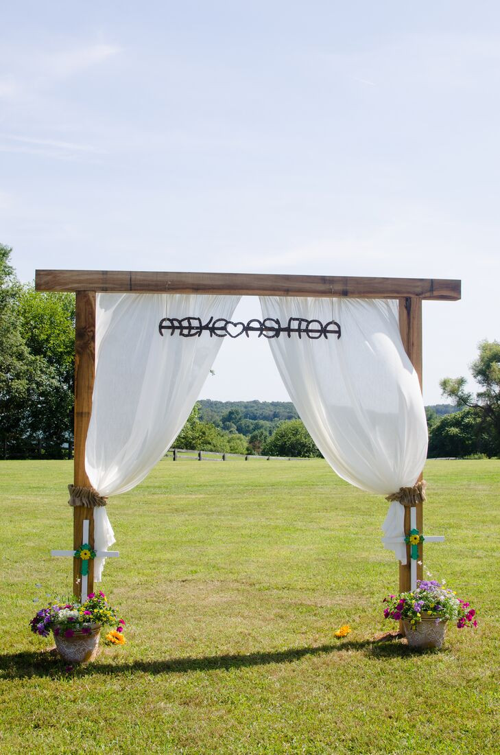 DIY Wood Wedding Arch
 Wooden Wedding Arch with Billowing Drapes