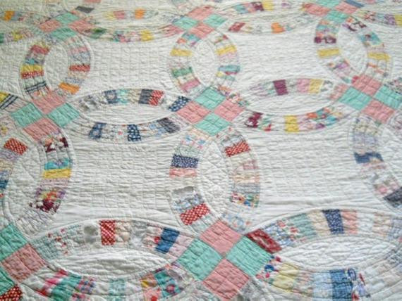 Double Wedding Ring Quilt For Sale
 SALEBeautiful vintage hand quilted double wedding ring
