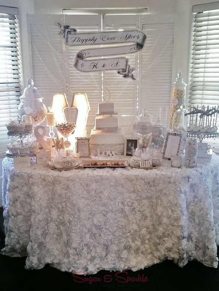 Engagement Party Table Ideas
 Glam white and silver engagement party dessert table See