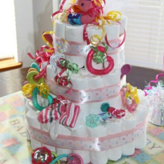 Essential Baby Shower Gifts
 Cute diaper cake for a baby girl baby shower What a