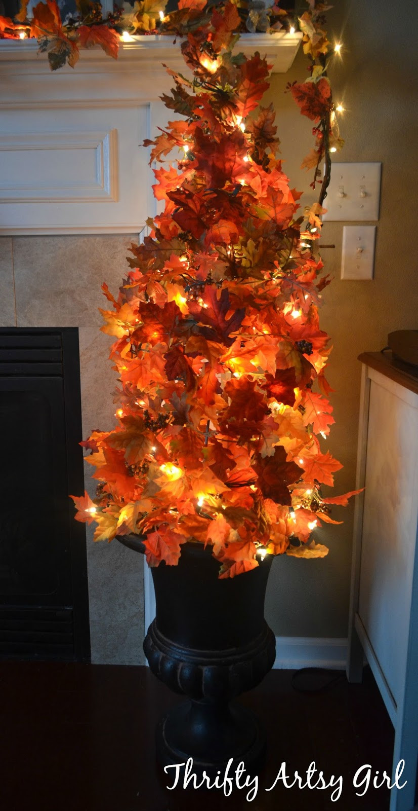 Fall DIY Decorations
 Thrifty Artsy Girl Easy DIY Fall Leaves Potted Topiary