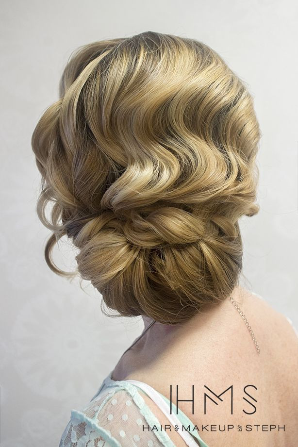 Finger Waves Wedding Hairstyle
 love the finger wave effect of this romantic wedding updo