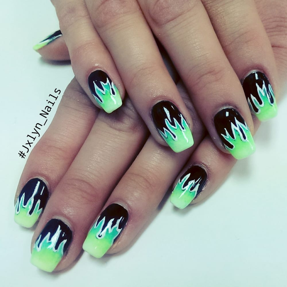 Flame Nail Designs
 Flame nail art and ombre gel mani by Jackie Yelp