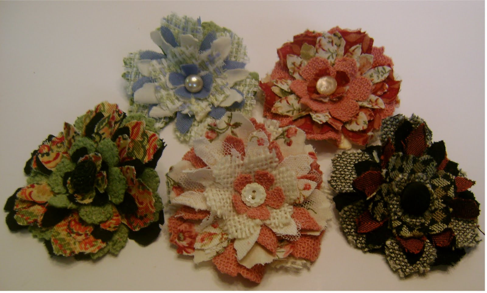 Flower Pins
 Adornments by lisa Fabric Flower pins