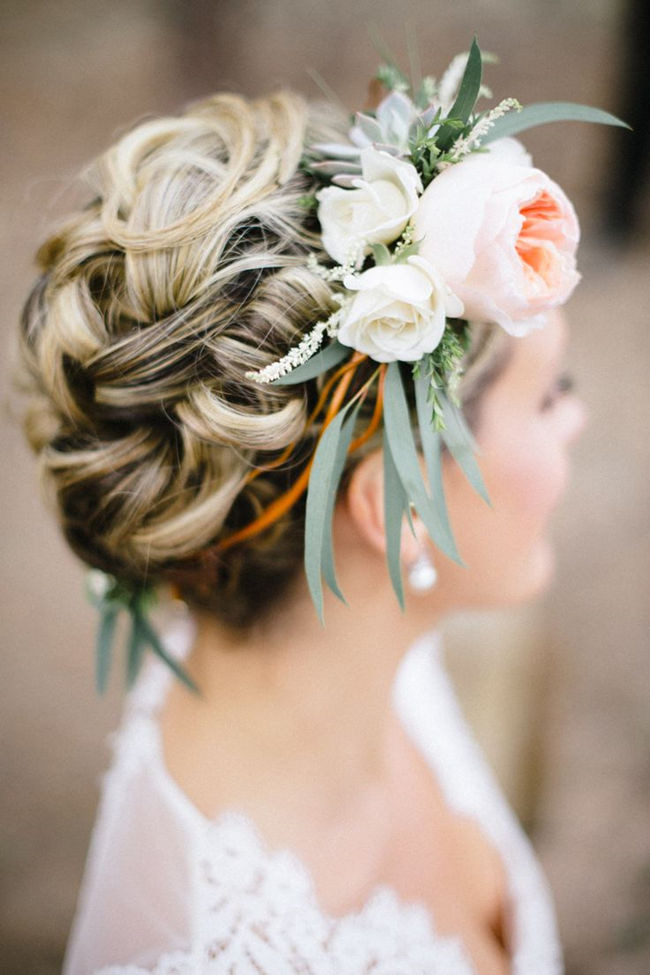 Flowers In Hair Wedding Hairstyles
 20 Gorgeous Wedding Hairstyles with Flowers EverAfterGuide