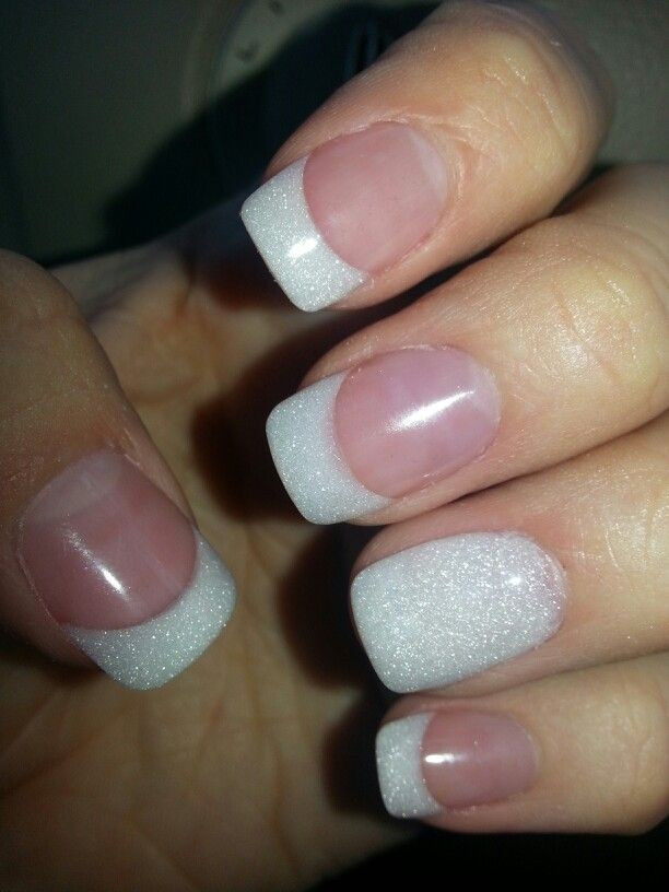 French Tip Acrylic Nails With Glitter
 Pearl white French tip with a little twist