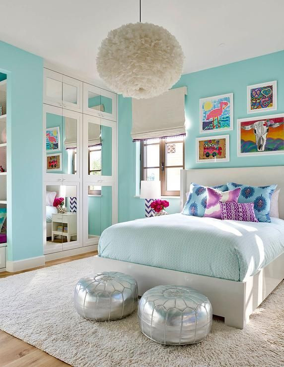 Girls Blue Bedroom
 Turquoise blue girls bedroom features a white feather