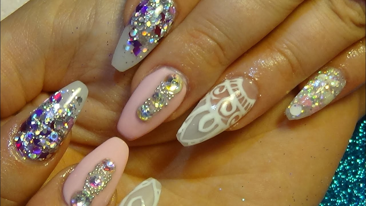 Glitter Acrylic Nails
 beautiful pink & glitter acrylic nails with hand painted