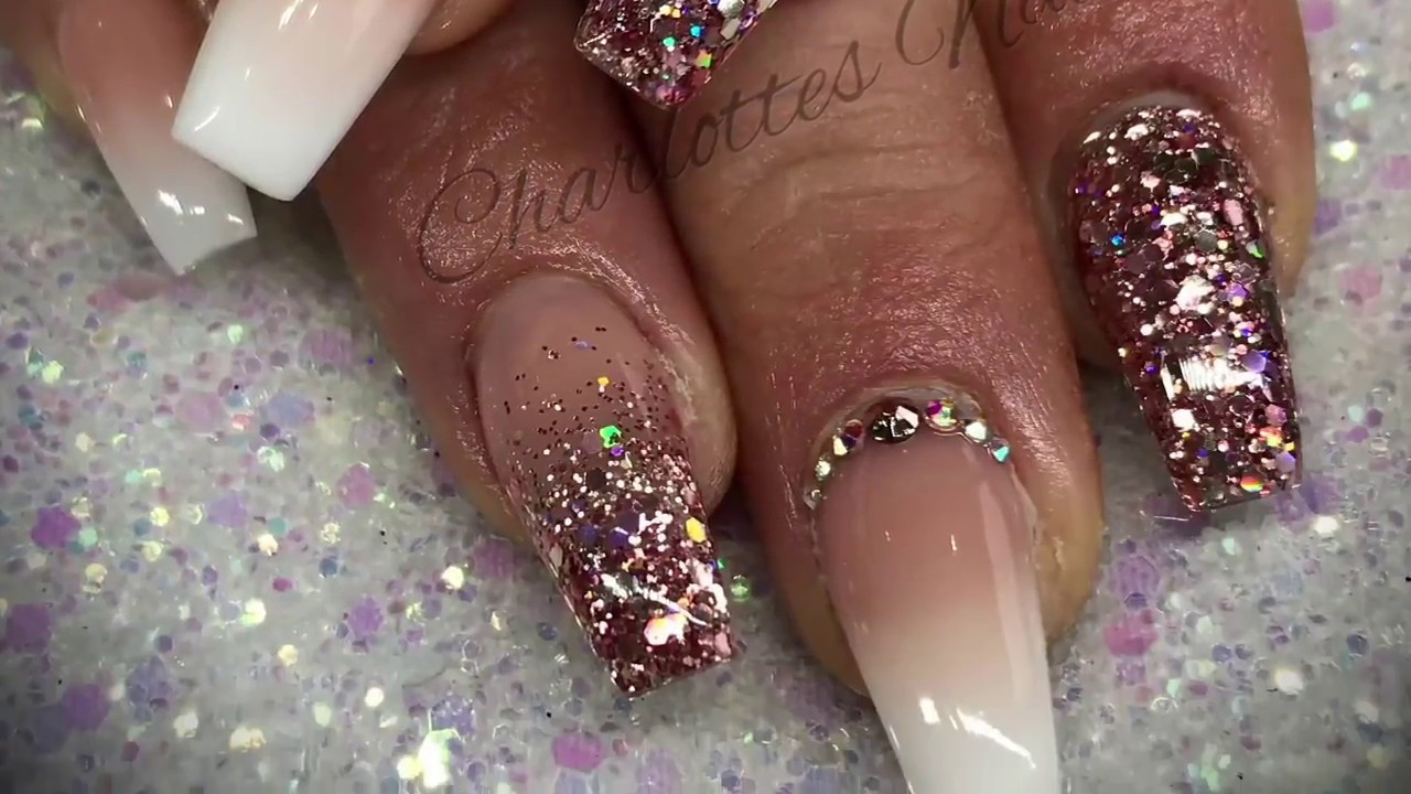 Gold Glitter Ombre Nails
 Acrylic nails ombré with rose gold glitter