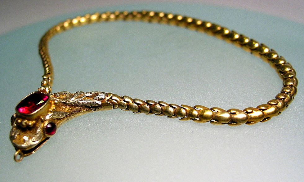 Gold Snake Bracelet
 Antique 15ct Gold Garnet Snake Bracelet c1840 from