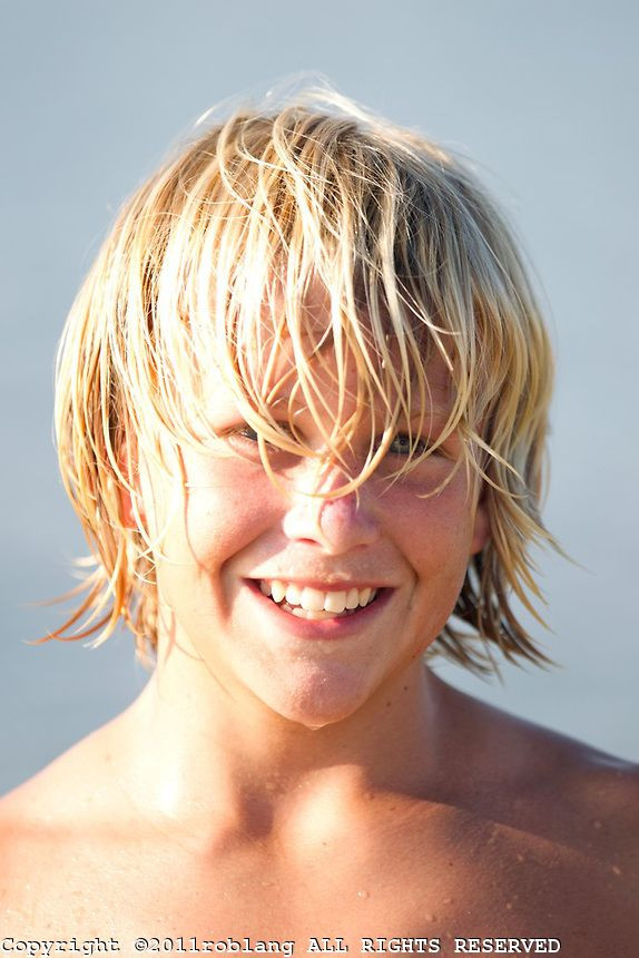 Hairstyles For Long Haired Boys
 blond boy with long wet hair smiling silas hair