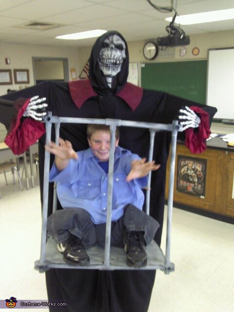 Halloween Party Ideas For 10 Year Olds
 Boy Trapped in Cage by Monster Halloween Costume Contest