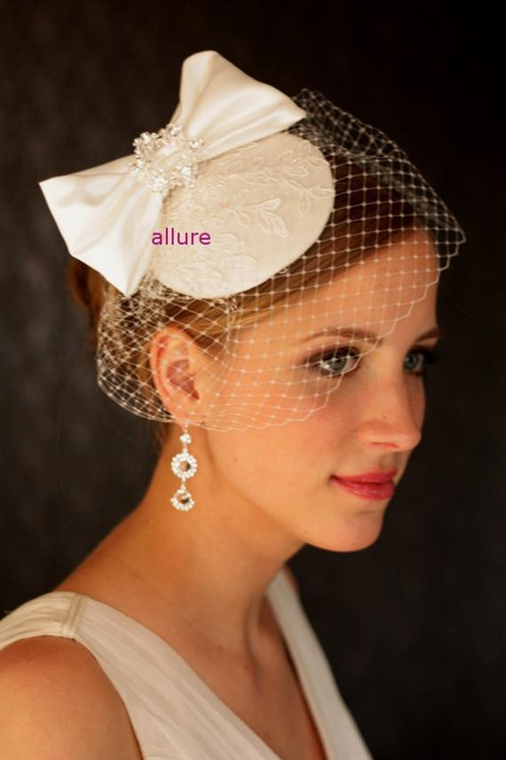 Hat With Veil For Wedding
 Items similar to Silk bow headdress 1950s BIRDCAGE VEIL