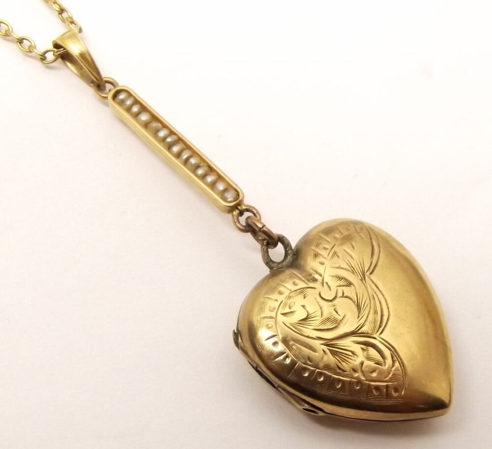 Heart Locket Necklace
 Antique 9K Gold Heart Locket Picture Frame Necklace Seed