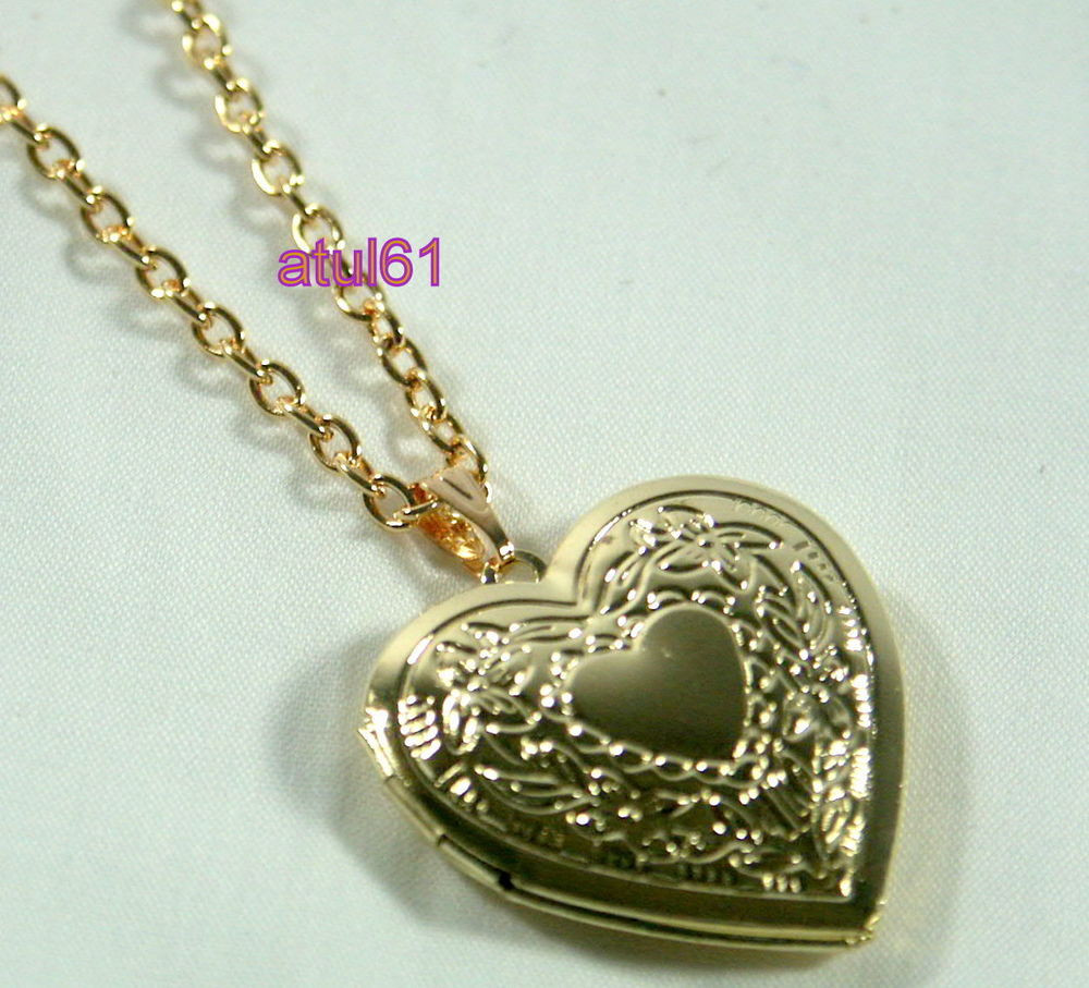 Heart Shaped Locket Necklace
 HEART SHAPED LOCKET PENDANT NECKLACE GOLD PLATED VINTAGE