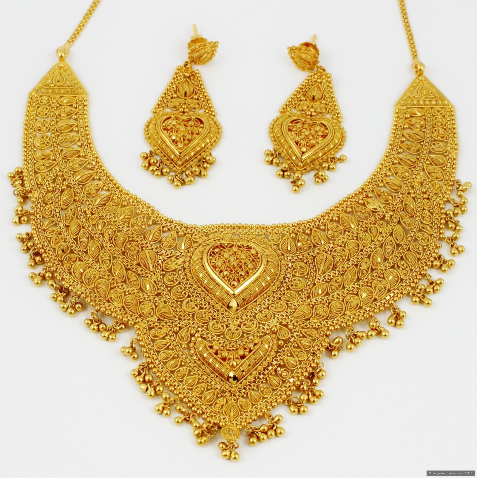 Indian Gold Earrings
 FARHANA JEWELLERY COLLECTION WORLD March 2013