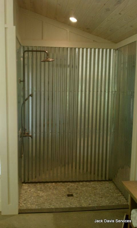Inexpensive Bathroom Shower Wall Ideas
 Corrugated tin shower with a river rock shower floor Very