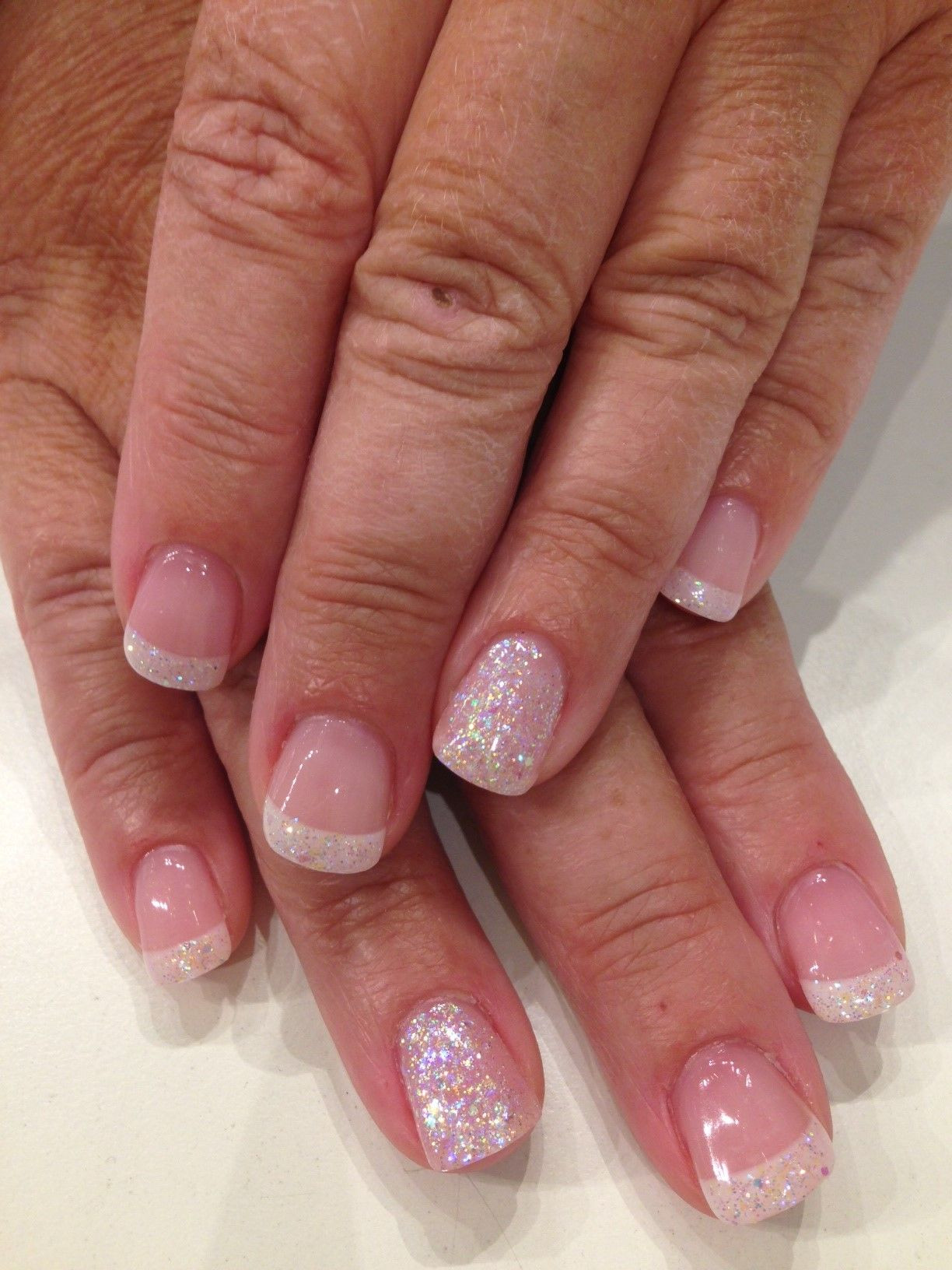 Iridescent Glitter Nails
 Bio Sculpture Gel French Manicure with overlay of