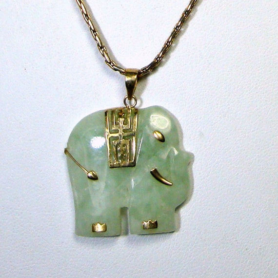 Jade Elephant Necklace
 Jade Elephant Pendant Gold Chain Trunk Up Stylized Soft Aqua