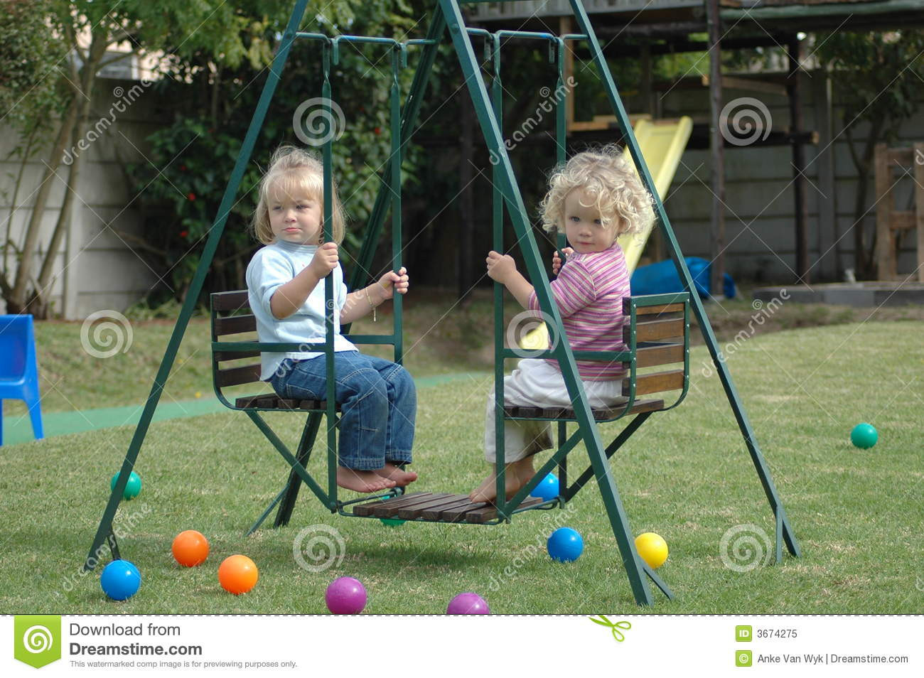 Kids Double Swing
 Children on swing stock image Image of bo s girl