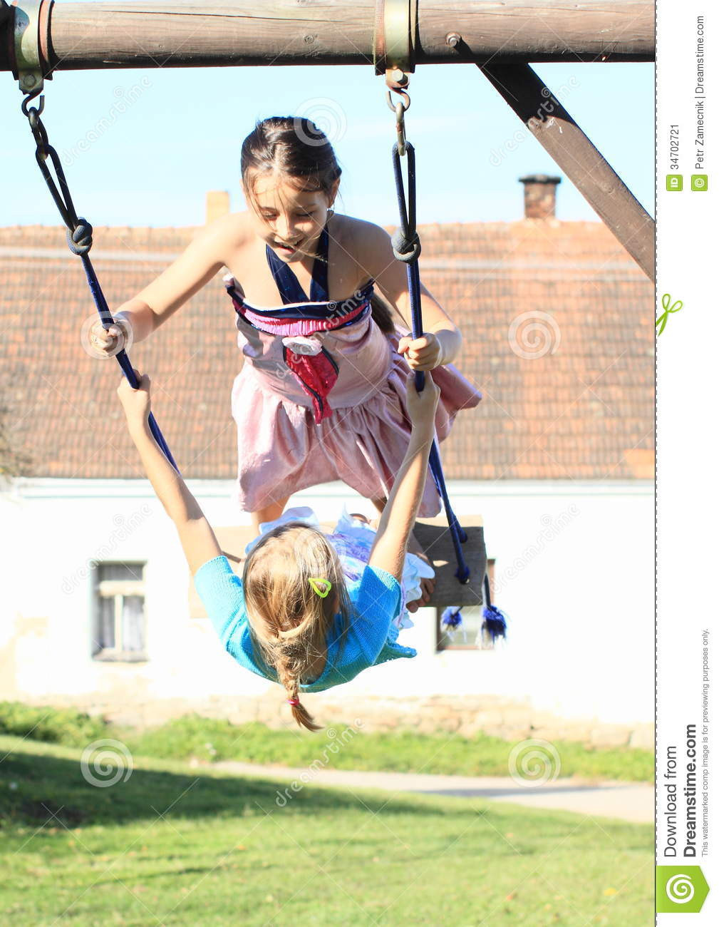 Kids On Swing
 Two Kids Girls Swinging Swing Stock Image Image of