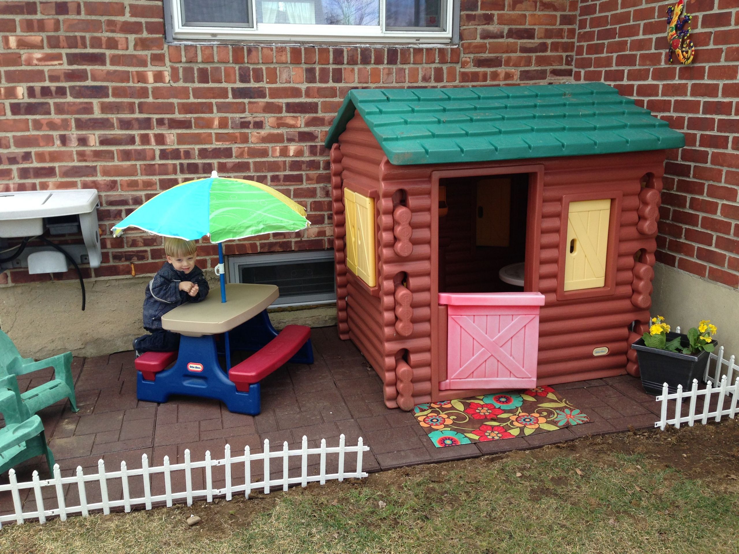 Kids Outdoor Plastic Playhouse
 Playhouse area The stones are recycled rubber tires Home