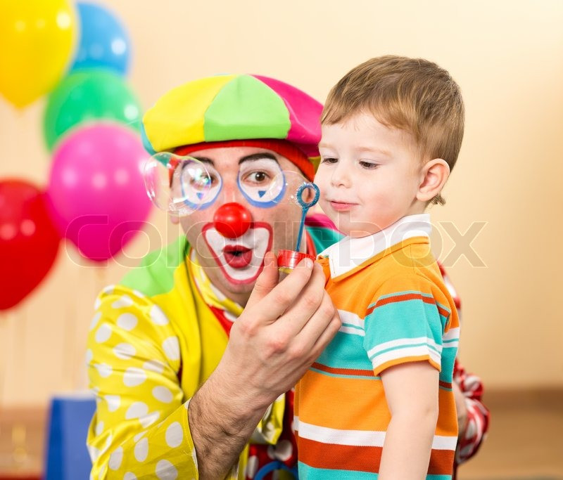 Kids Party Clown
 Joyful kid with clown on birthday party