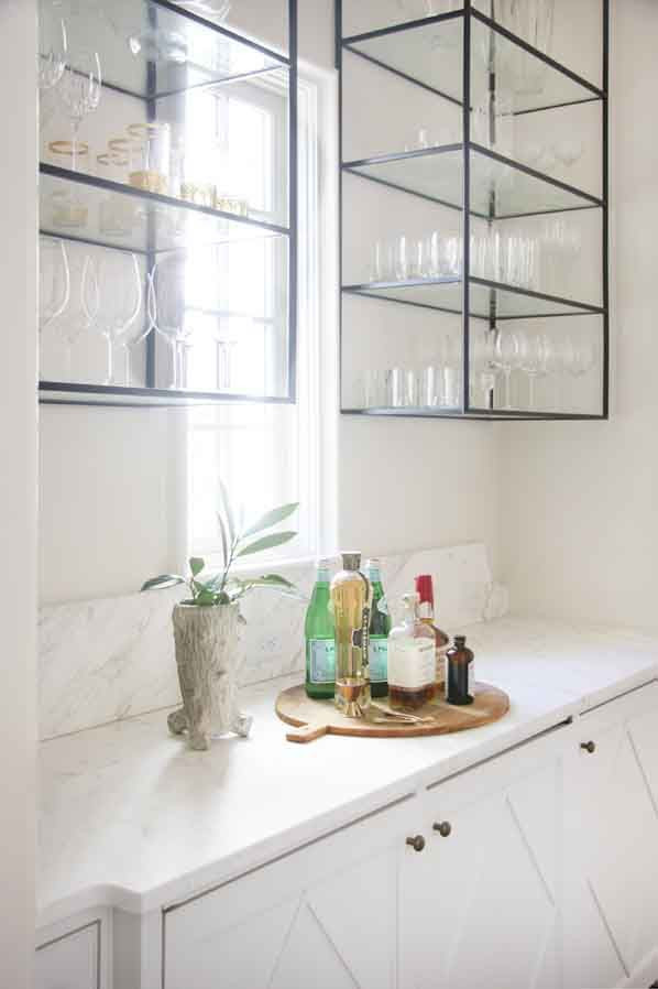 Kitchen Wall Shelving Units
 Bar with Custom Iron & Glass Cabinets by Lisa Sherry
