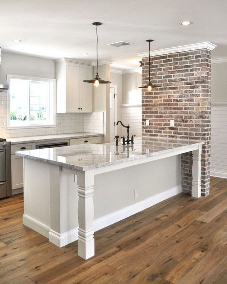 Kitchens With Brick Accent Walls
 kitchen counter table bar wood floors subway tile and