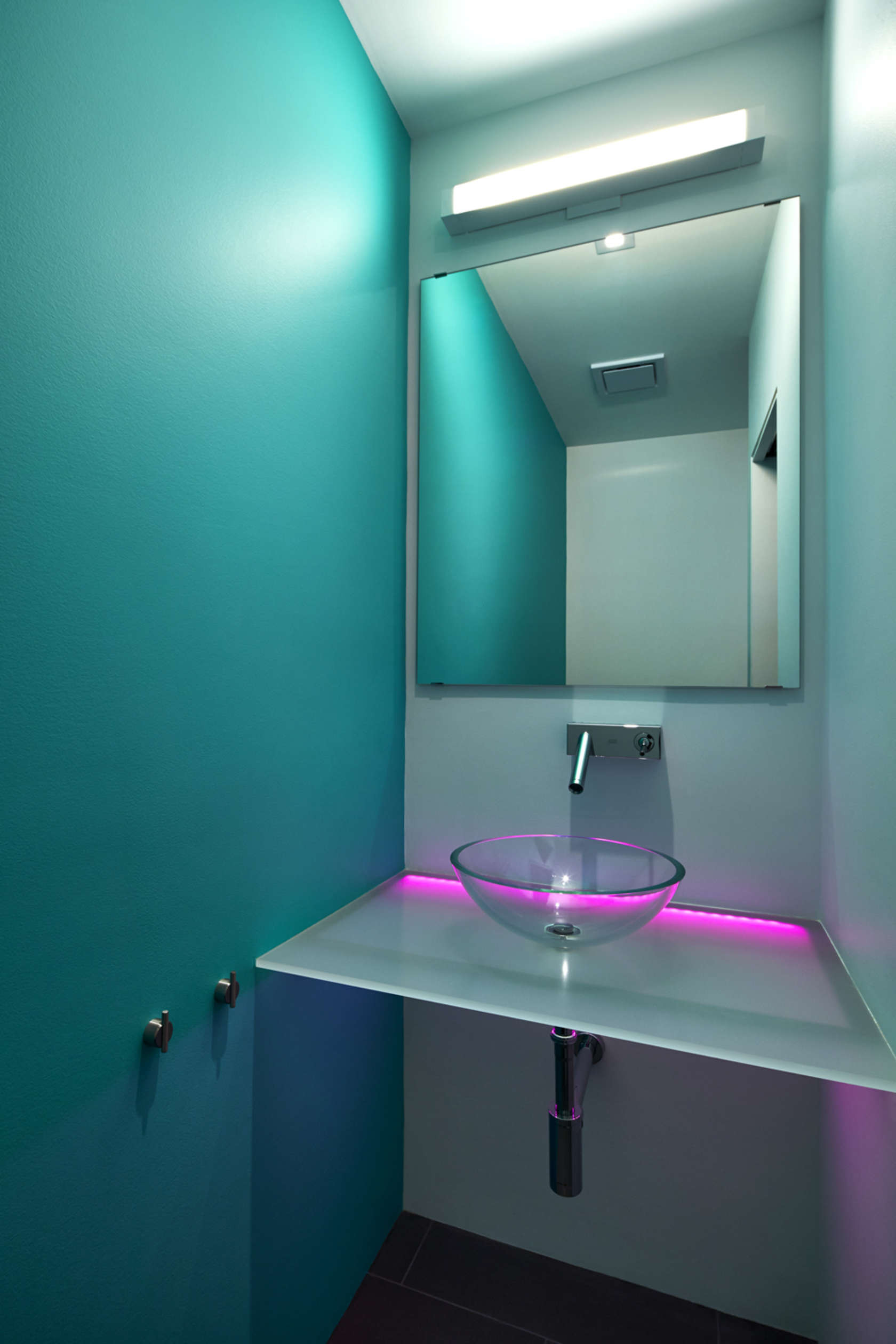 Led Bathroom Lighting
 A Modern Row House for a Fun Couple with a Love of Cooking