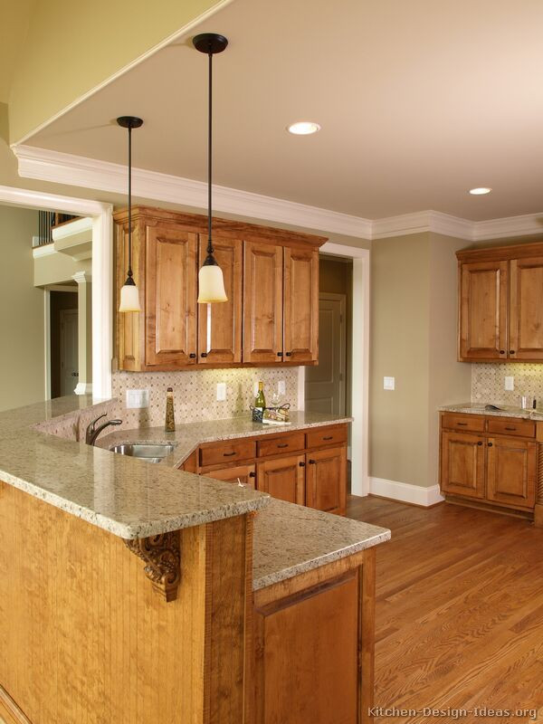 Light Kitchen Colors
 Peninsula with bar to creat an open concept to the dinning