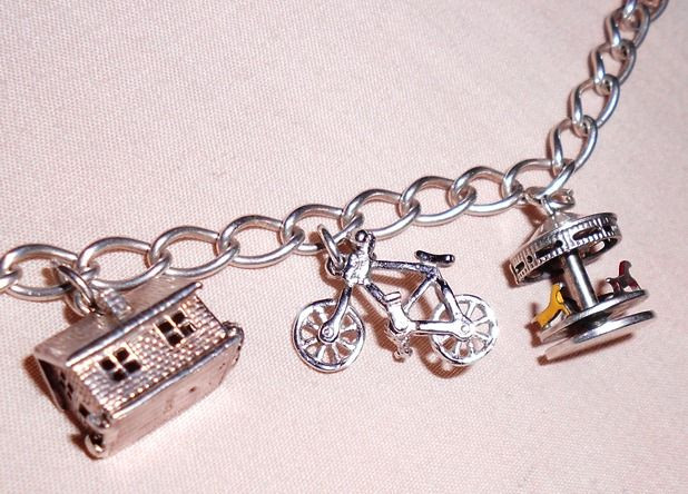 Lovely Charm Bracelet
 Language the necklace that mr harvey kept shows you how