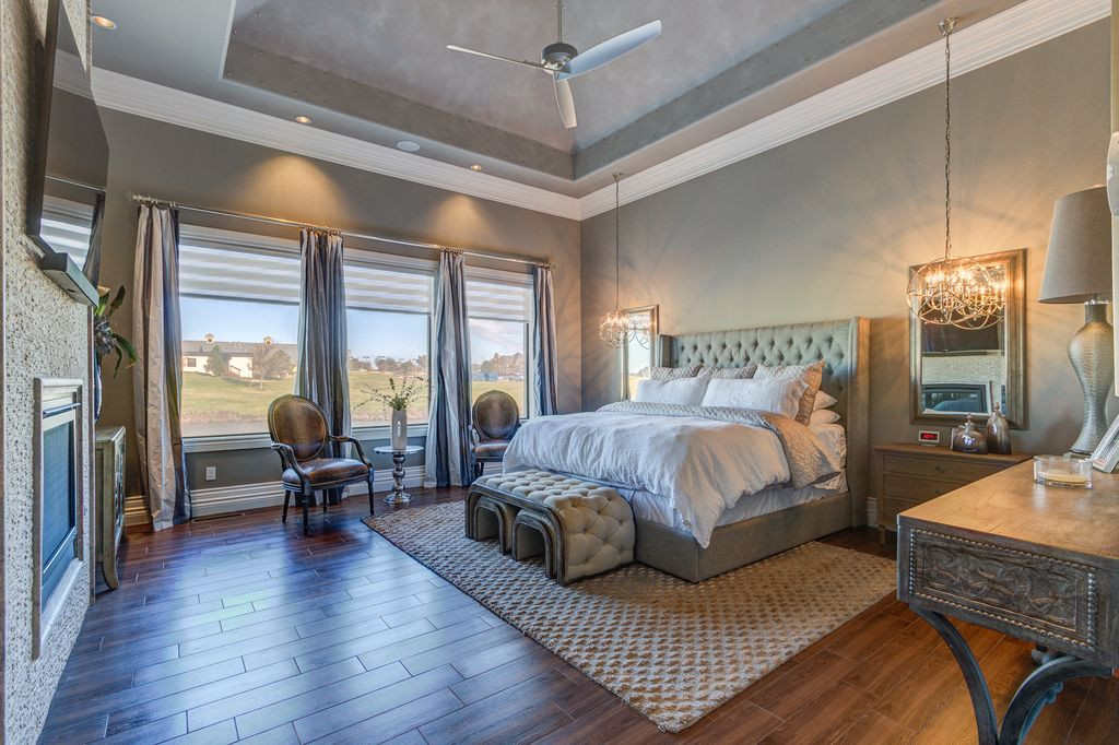 Master Bedroom Ceiling Fans
 Master Bedroom with metal fireplace & Crown molding in