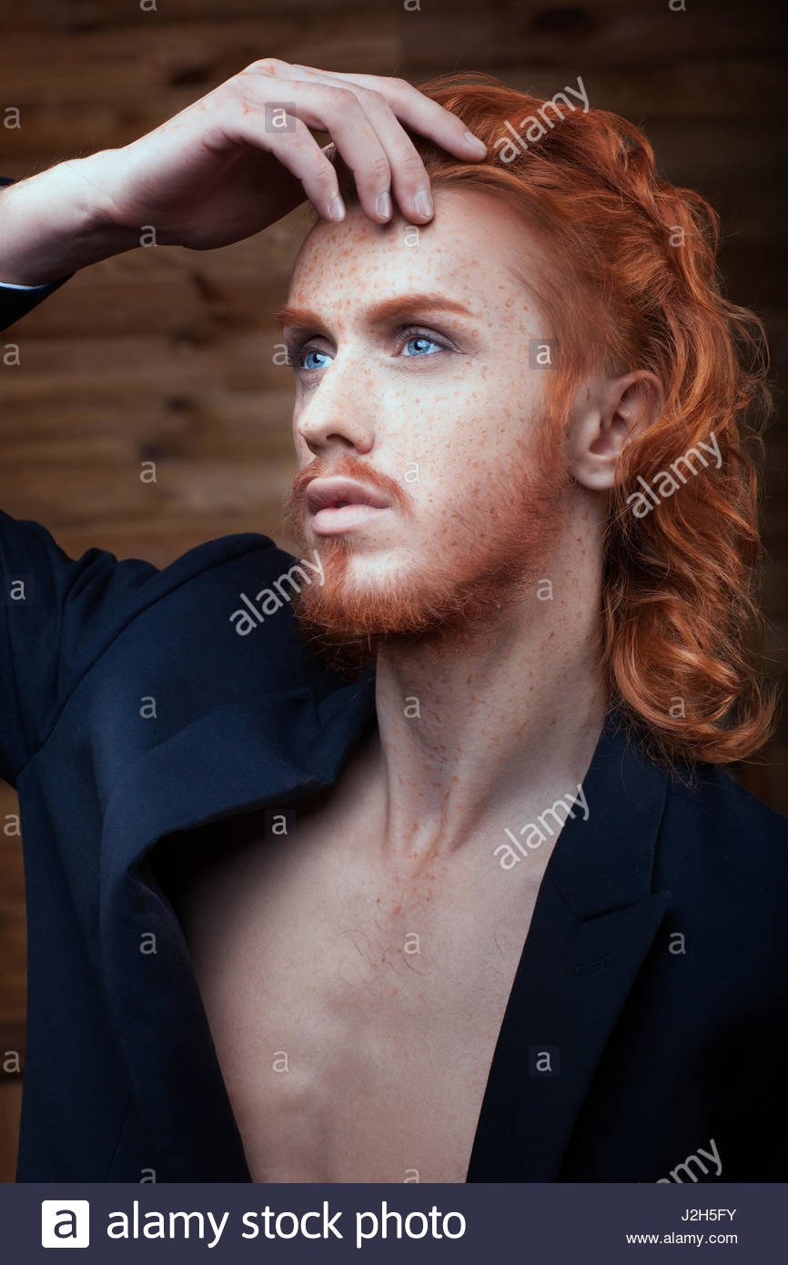 Mens Metro Hairstyles
 Portrait of a Man with red hair he is metro ual Stock