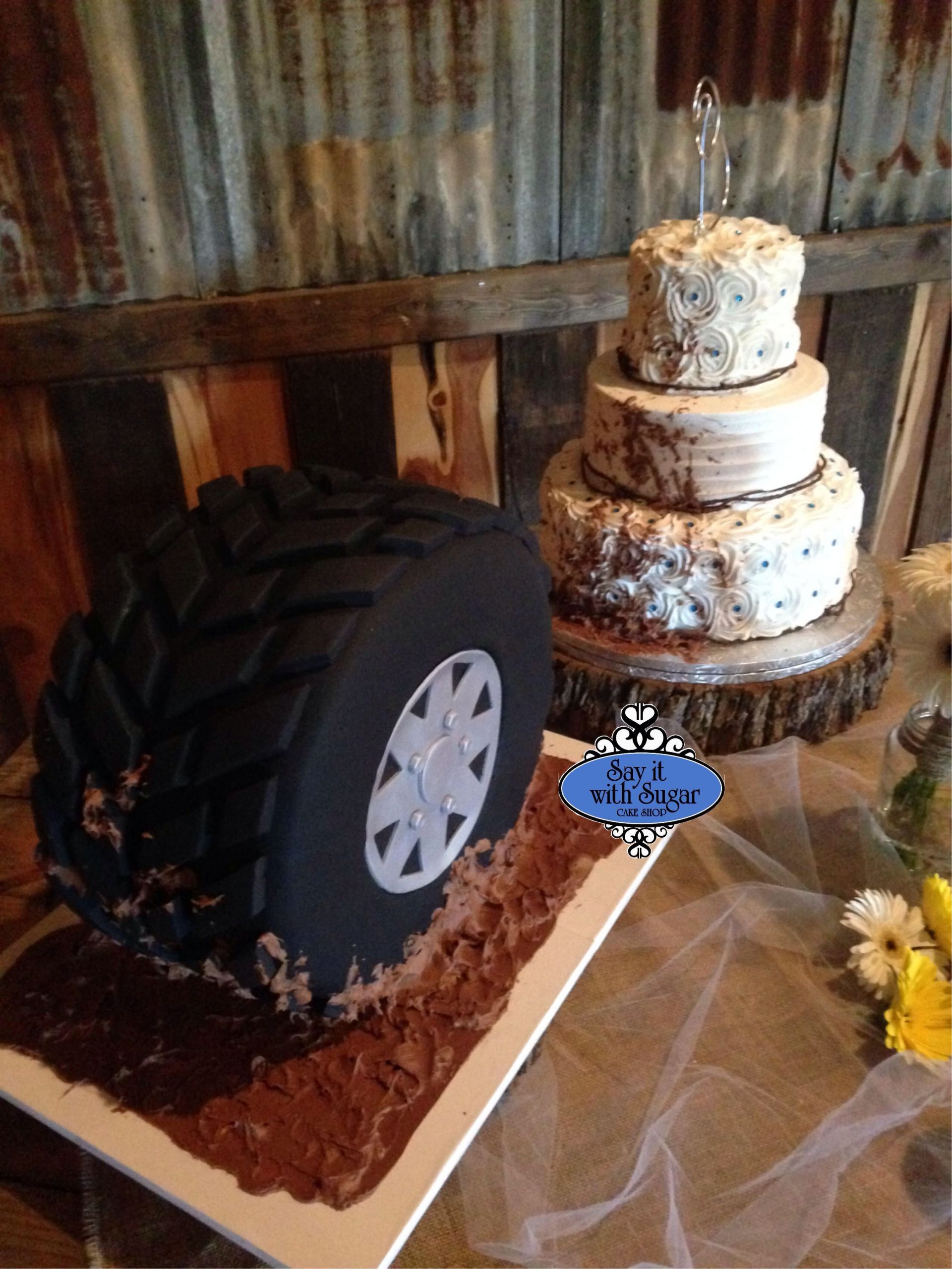 Mudding Wedding Cakes
 Mudding tire grooms cake spinning mud on a brides cake