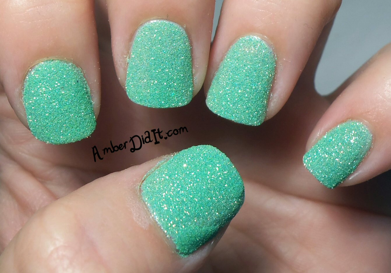 7. Glitter Nail Designs with Vibrant Colors - wide 5