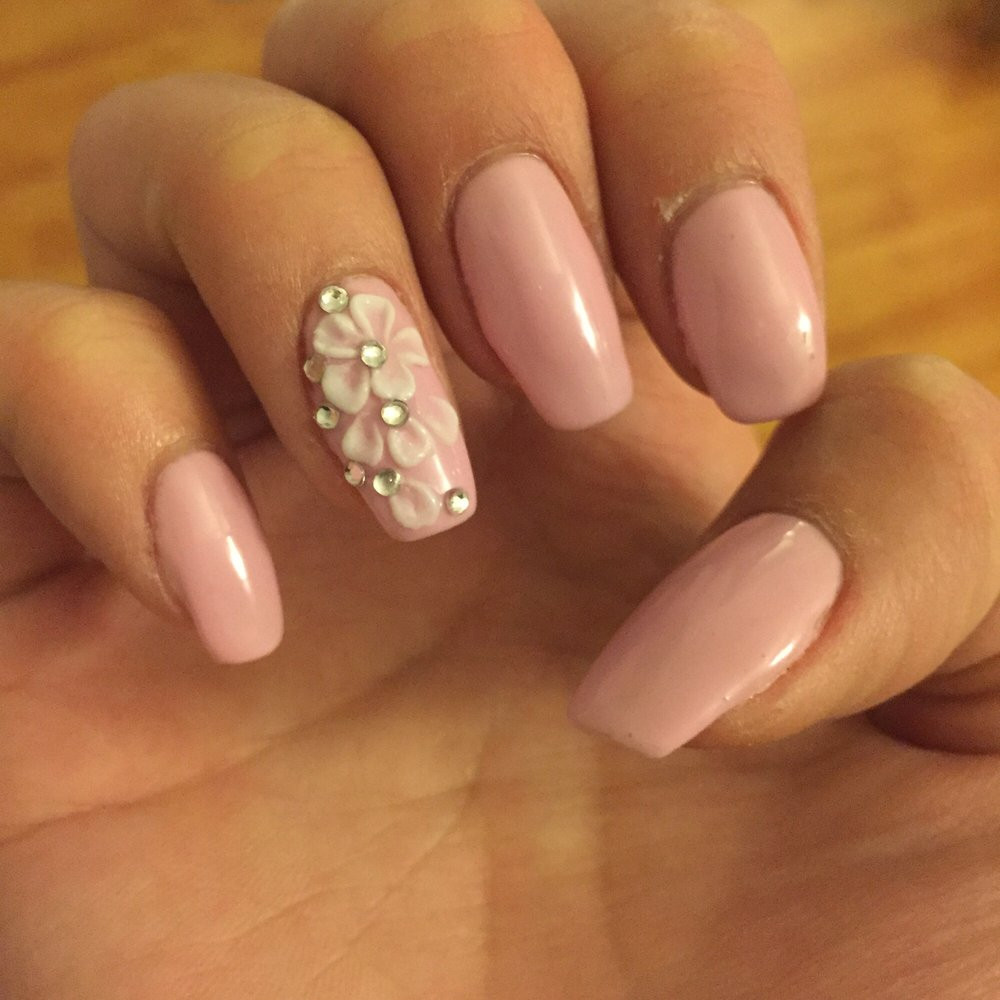 Natural Nail Designs
 Pink gels with white 3D nail art with jewels on natural
