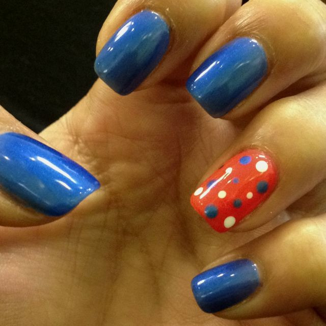 Orange And Blue Nail Designs
 Orange and blue nail design polka dot