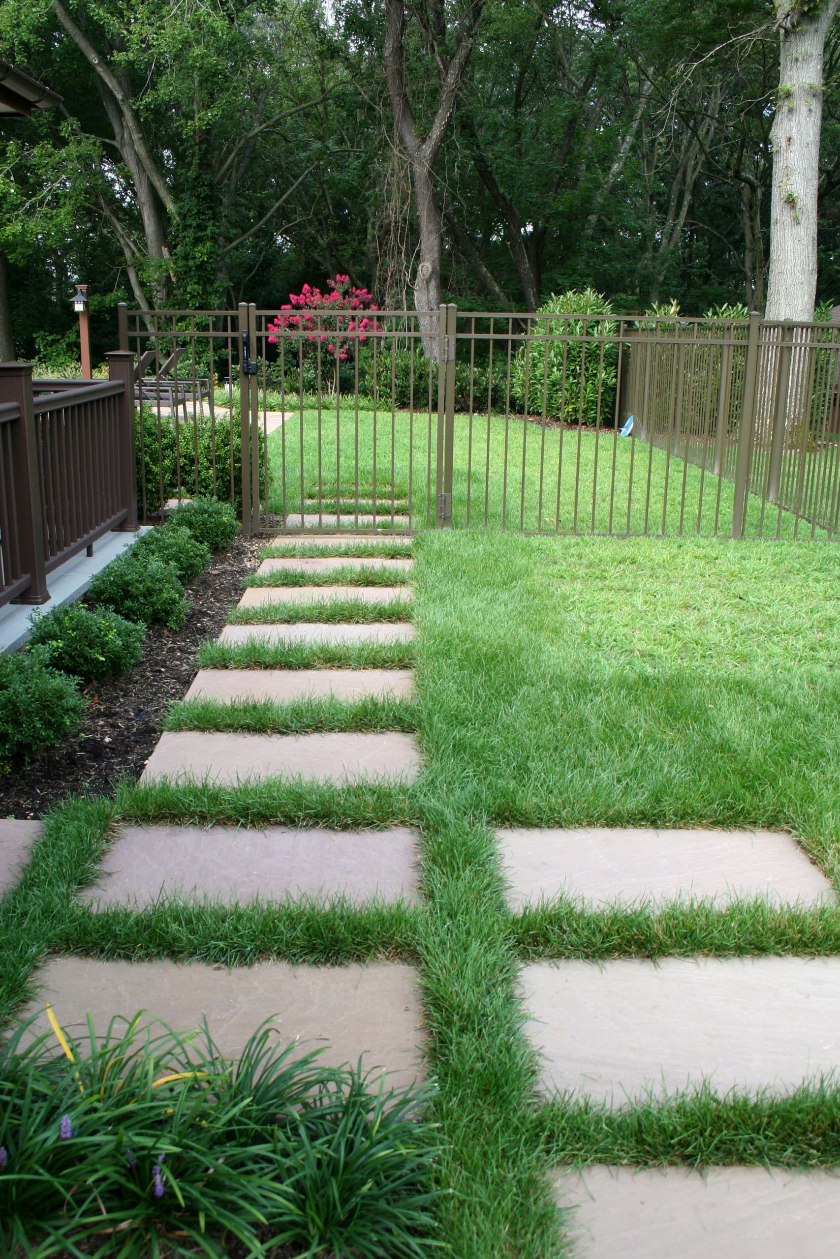 Outdoor Landscape With Stones
 2 x2 bluestone stepping stones set in the lawn