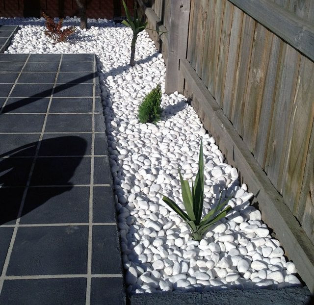 Outdoor Landscape With Stones
 Everything You Need to Know About Using Pebbles in the