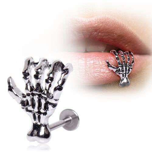 Peircings Body Jewelry
 The allmighty skeleton hand snake bite