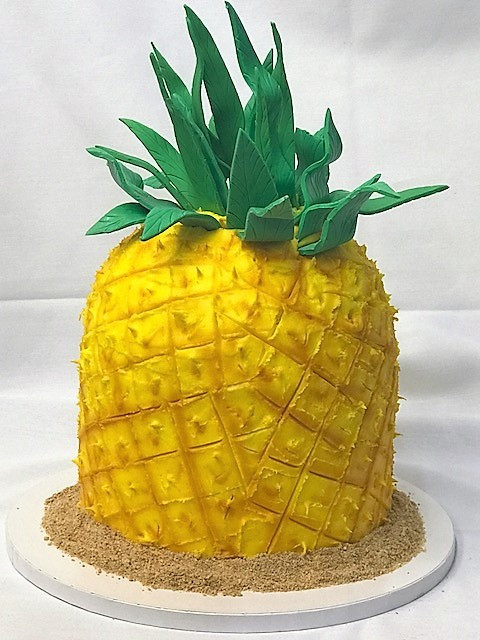 Pineapple Birthday Cake
 Pineapple Sculpted celebration cake from Cinotti s Bakery