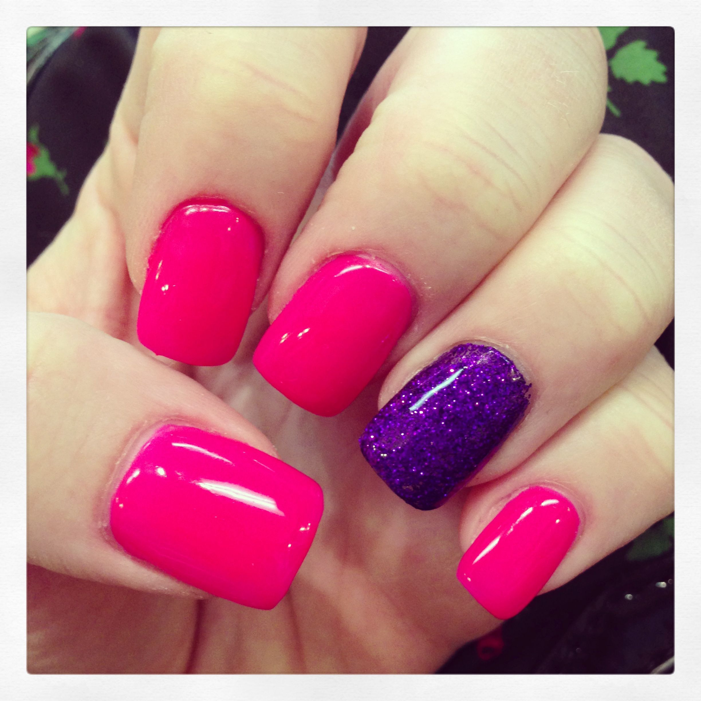 Pink And Purple Nail Designs
 Hot pink gel nails with purple rockstar accent